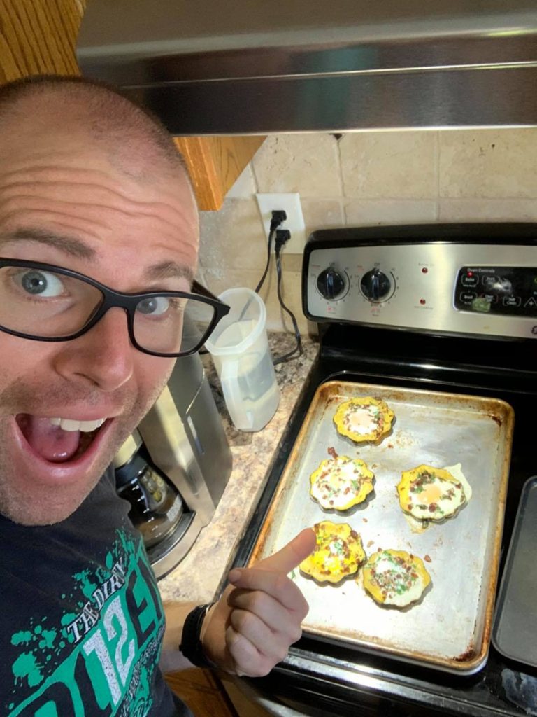 Image of local TV news anchor showing off his Egg in the Hole Acorn Squash