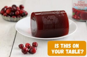 Photo of canned cranberry sauce with the caption "Is This on Your Table?"