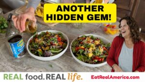 Photo of Krista preparing the Chile Lime Salmon Fajita Salad with the caption "ANOTHER HIDDEN GEM!"